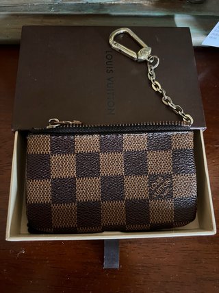 Pochette Louis Vuitton con catenella