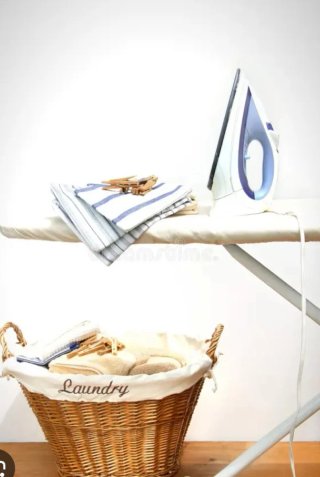 Tarea de planchar ropa