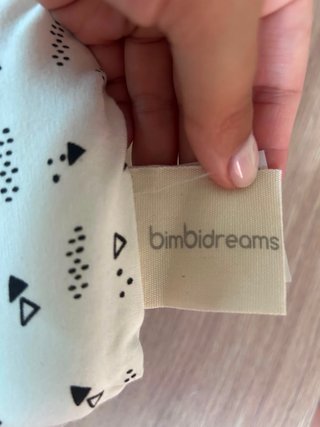 Funda reversible con relleno y protectores.