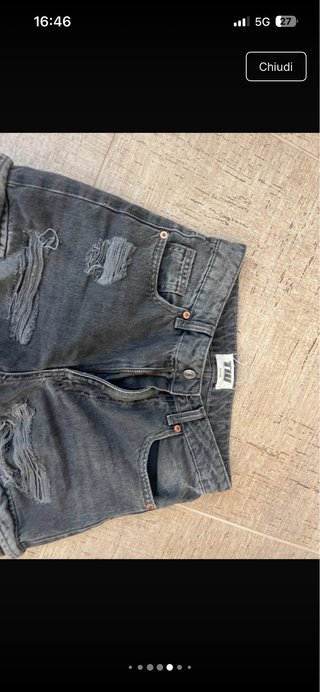 Jeans strappati grigi