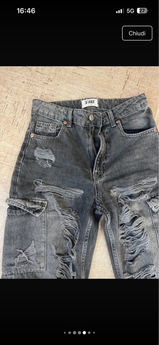 Jeans strappati grigi
