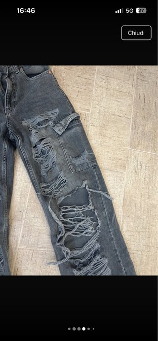 Jeans strappati grigi