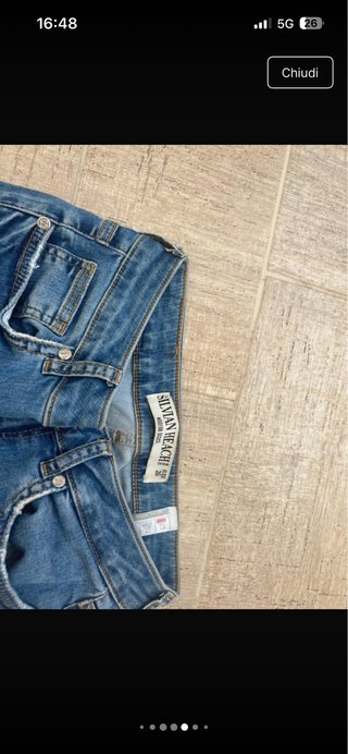 Jeans vita alta strappati