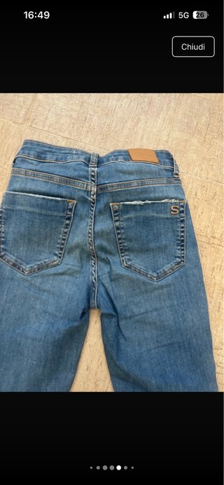 Jeans vita alta strappati