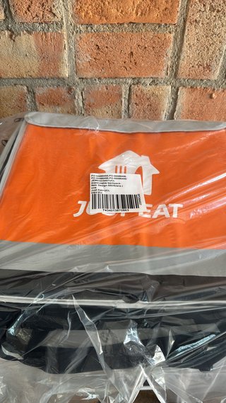 Mochila reparto Just Eat naranja y gris