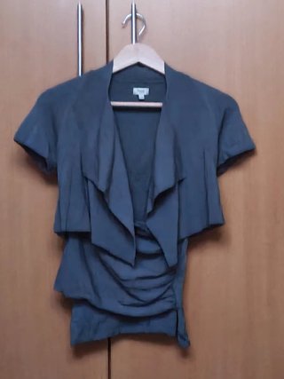 Pantalones verde azulado con lunares beiges