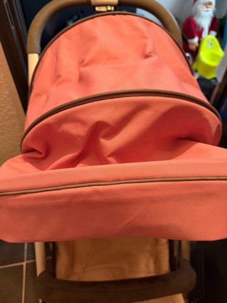 Silla de paseo rosa con funda