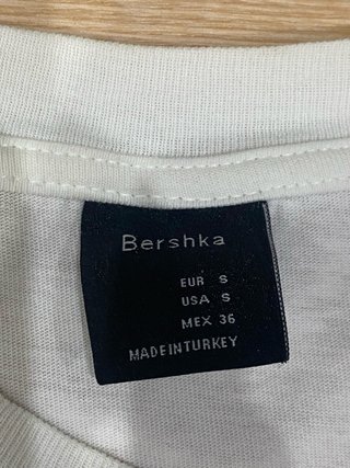 Camiseta Bershka blanca hombre con detalles negros