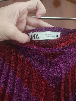 Falda plisada brillante rosa y morada