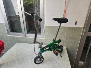 Bici de payaso verde