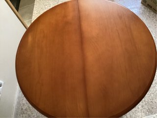 Mesa redonda extensible de madera maciza, 399 €