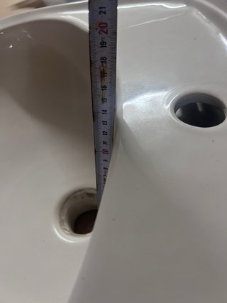 Lavabo de cerámica con pie