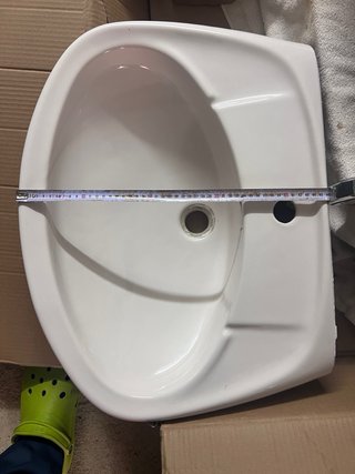 Lavabo de cerámica con pie