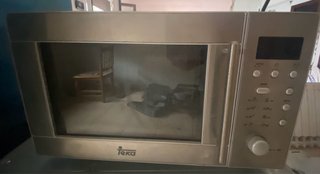 Horno Teka Negro con Puerta Ovalada