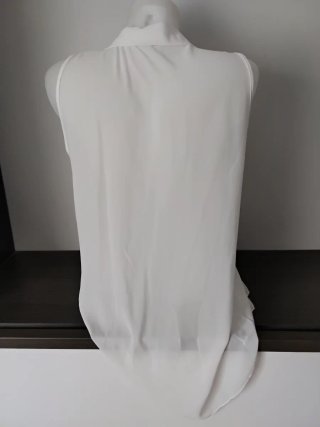Blusa sin mangas semitransparente