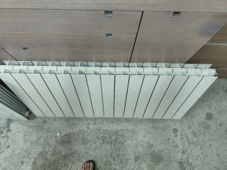 2 Radiadores de agua de 12 y 15 elementos.