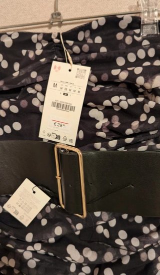 Vestido negro lunares con cinturón