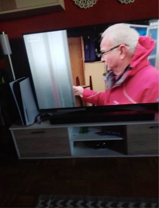 Smart TV LG 55 con mando y su base