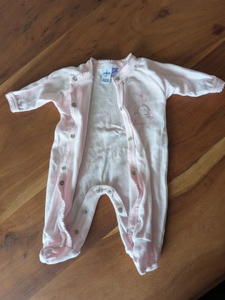 Mono bebé rosa con estampado de conejito