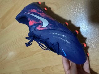 Zapatillas de fútbol Nike azules y rosa