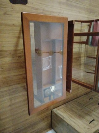 Mesa de centro de cristal y madera elevable