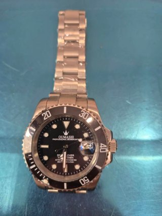 Reloj OUMASHI Profesional Negro/Plateado. Mecanico