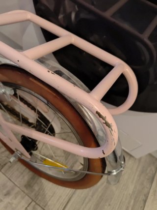 Bicicleta infantil rosa con cesta