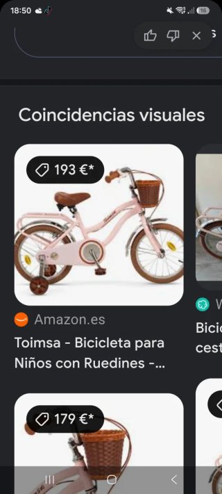 Bicicleta infantil rosa con cesta