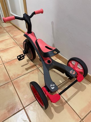 Triciclo evolutivo rosa y negro