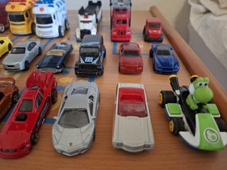 Lote 23 coches y vehículos de juguete