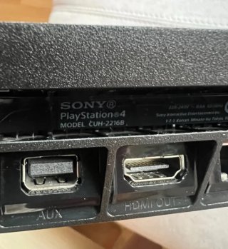 PS4 + 2 Juegos y Accesorios