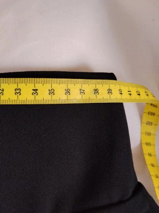 Falda pantalón negra volantes