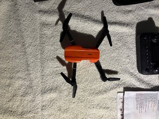 Dron con cámara Naranja y Negro