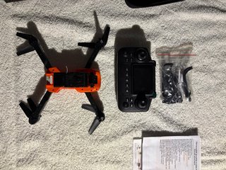 Dron con cámara Naranja y Negro