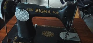 Máquina de coser Sigma antigua
