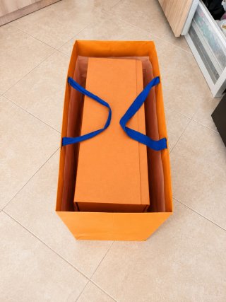 Bolsa y caja Louis Vuitton naranja