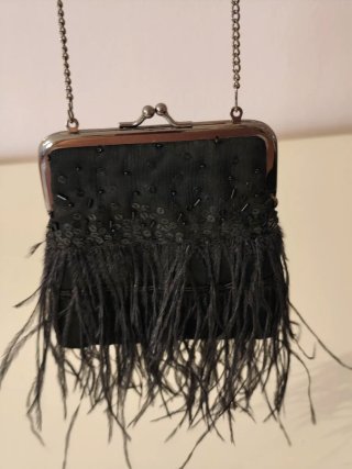 Bolso de fiesta negro plumas y lentejuelas
