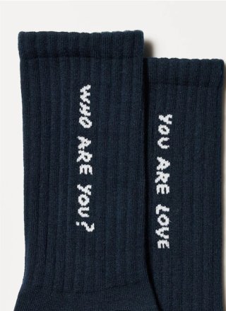 Uniqlo Keith Haring calcetines antiolor