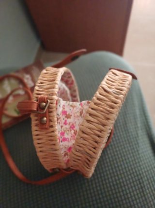 Bolso redondo de paja