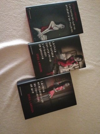 Tres tomos de libros