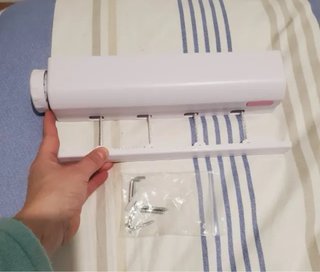 Reloj de pared y tendedero