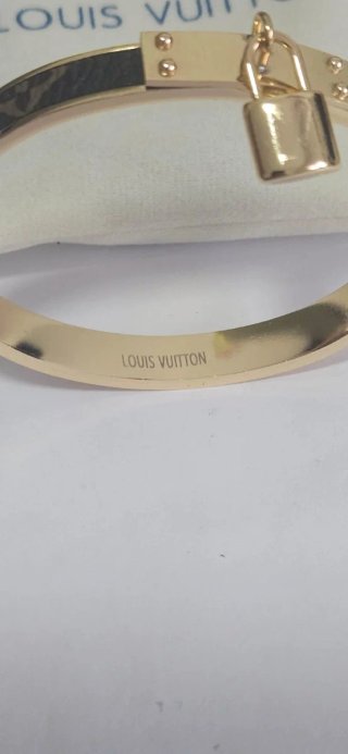 Pulsera Louis Vuitton dorada y marrón