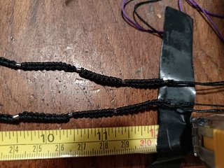 Collana macramè con moneta e punta