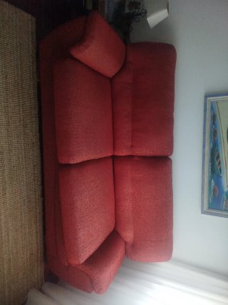Sofá cama vintage rojo