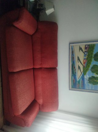 Sofá cama vintage rojo