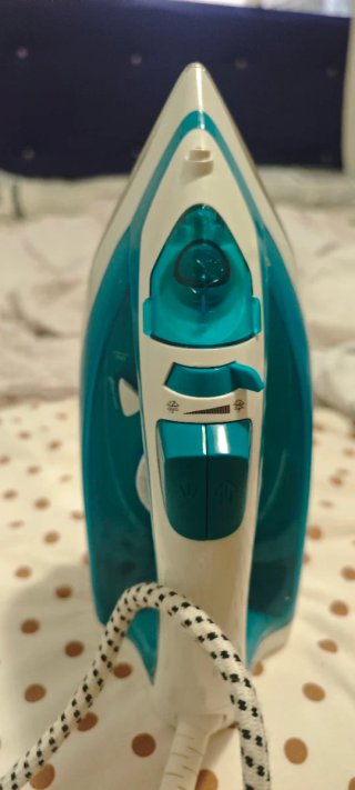 Plancha de vapor azul y blanca