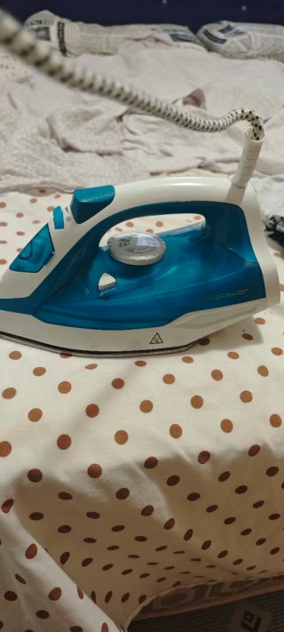 Plancha de vapor azul y blanca