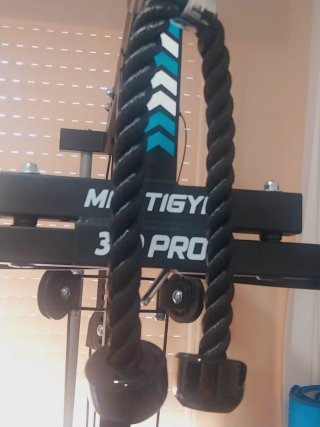 Multiestación de gimnasio con discos de peso