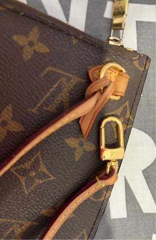 Pochette Louis Vuitton Marrón