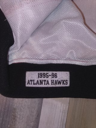Chaqueta Hawks Mitchell & Ness